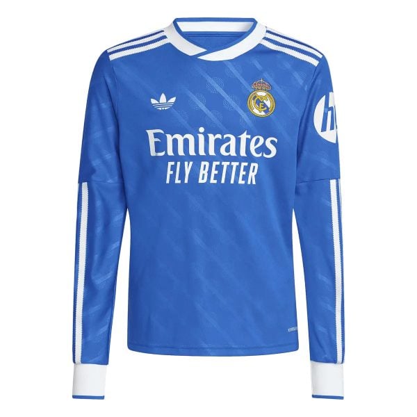 Real Madrid blue football jersey with Emirates Fly Better sponsor and crest on the chest.