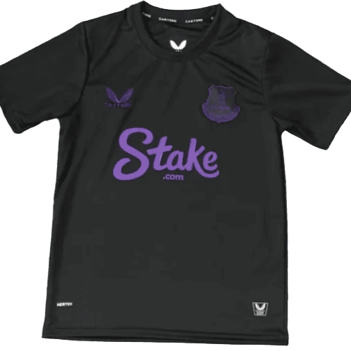 Black short-sleeve athletic jersey with a large purple Stake.com logo across the chest and a purple team crest on the left chest.
