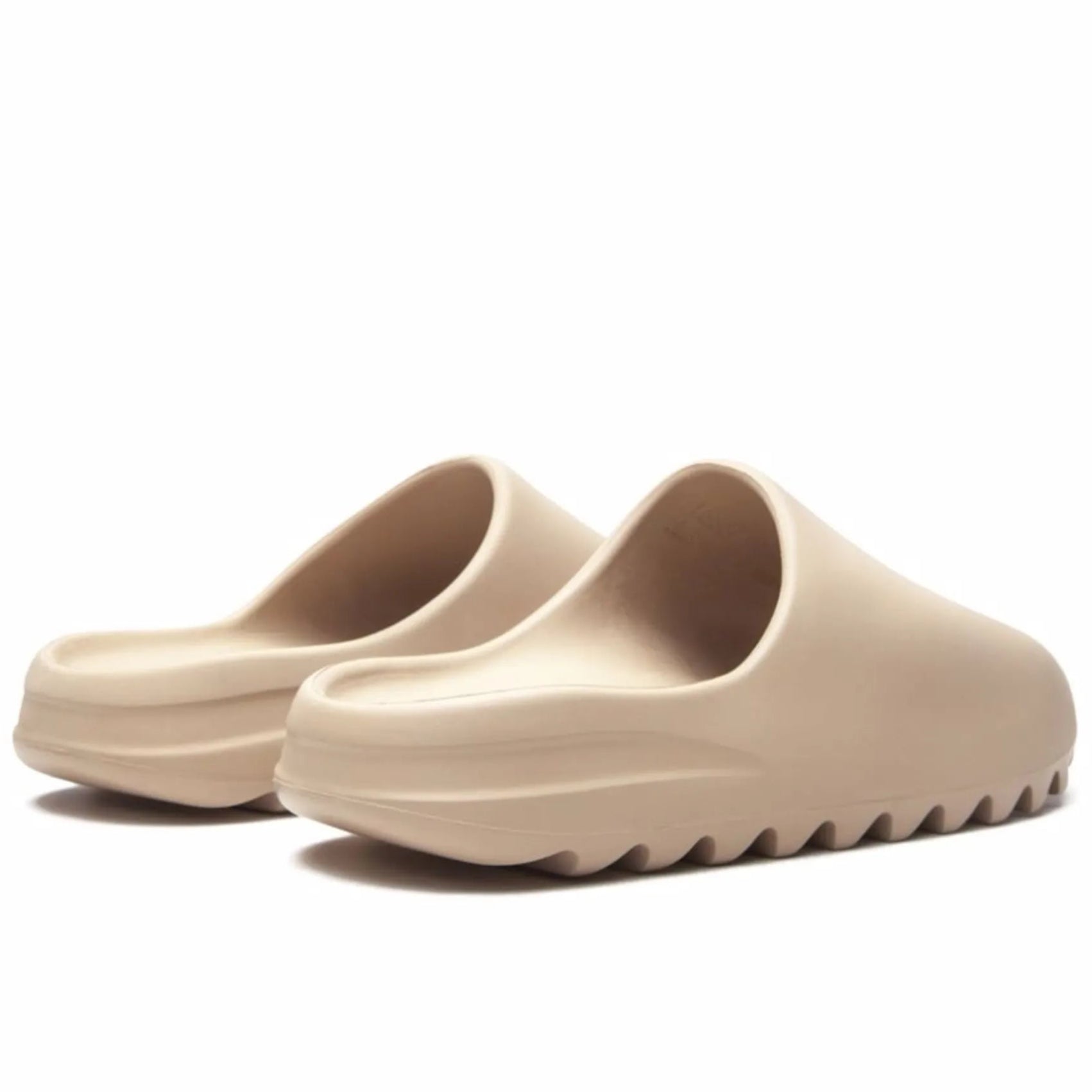 17738013_37285939_2048 | AE JERSEY Beige platform slide sandals with thick ridged soles, shown from a low front angle.