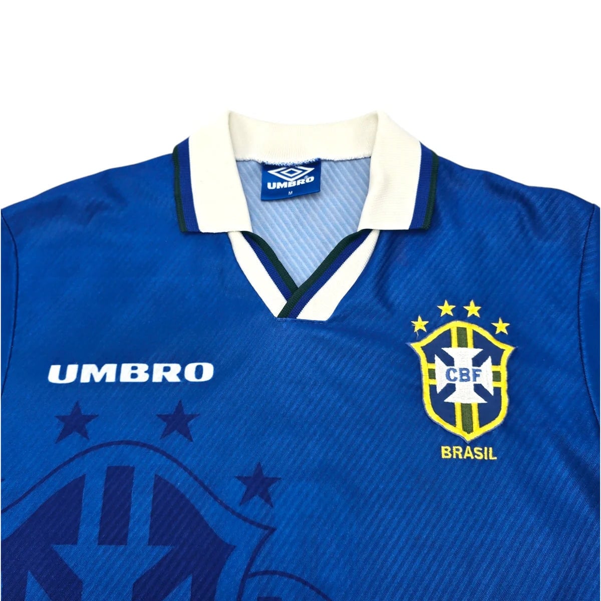 199394-brazil-away-football-shirt-m-umbro-ff204564-706326 | AE JERSEY Brazil national football team blue jersey with CBF crest, Umbro logo, and white collar detail, worn by Brazil.
