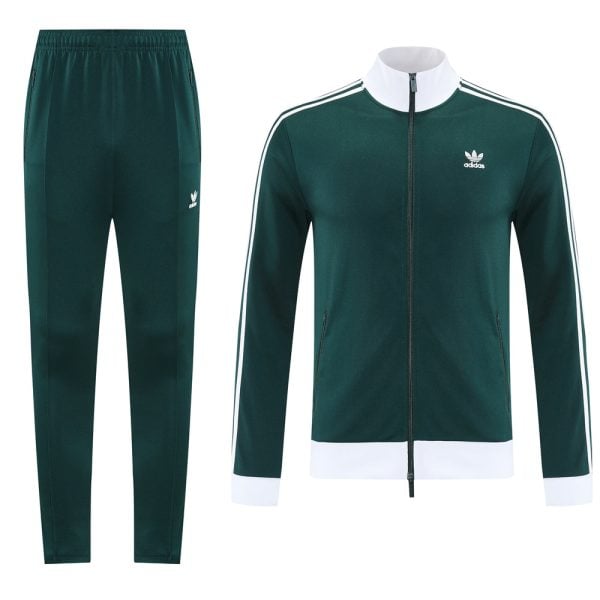 Dark green Adidas tracksuit set with a zip-front jacket featuring white stripes and matching pants.