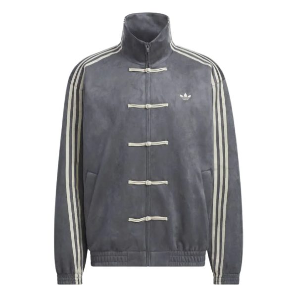 Gray track jacket with Chinese knot closures, cream sleeve stripes, and a small Adidas trefoil logo on the left chest.