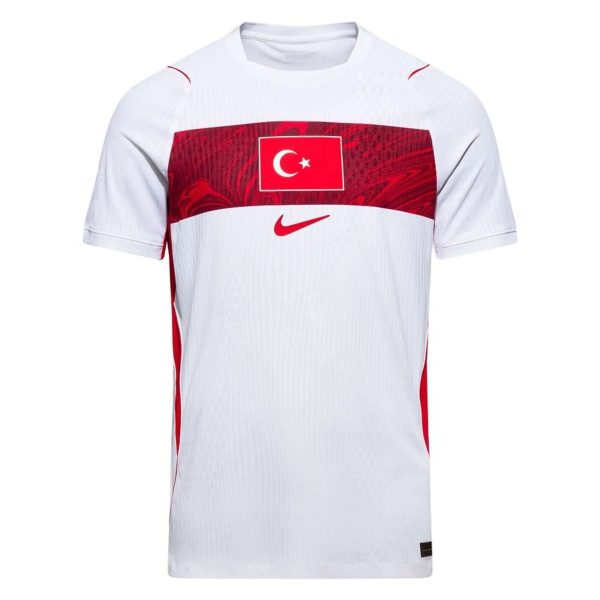 White athletic jersey with a red band across the chest featuring the Turkish flag and a red Nike swoosh below it