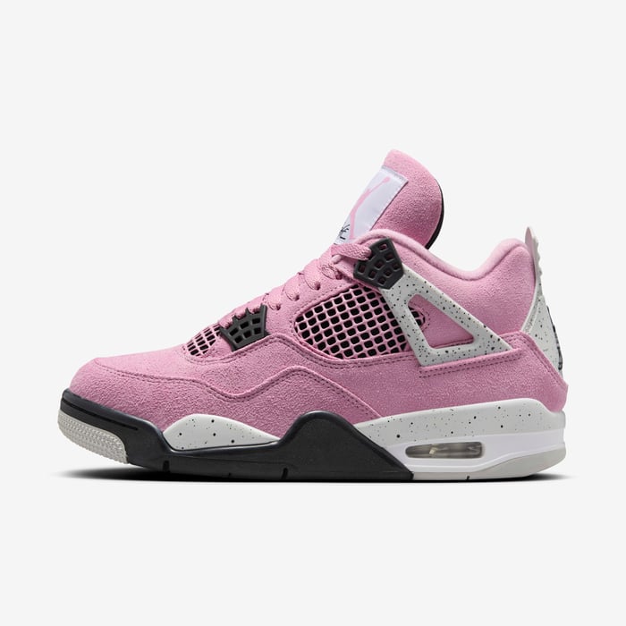 35e5bd28_8541_41b8_be7f_58837228706a | AE JERSEY Pink suede basketball sneaker with black outsole, white speckled midsole, gray heel cage, and mesh side panels