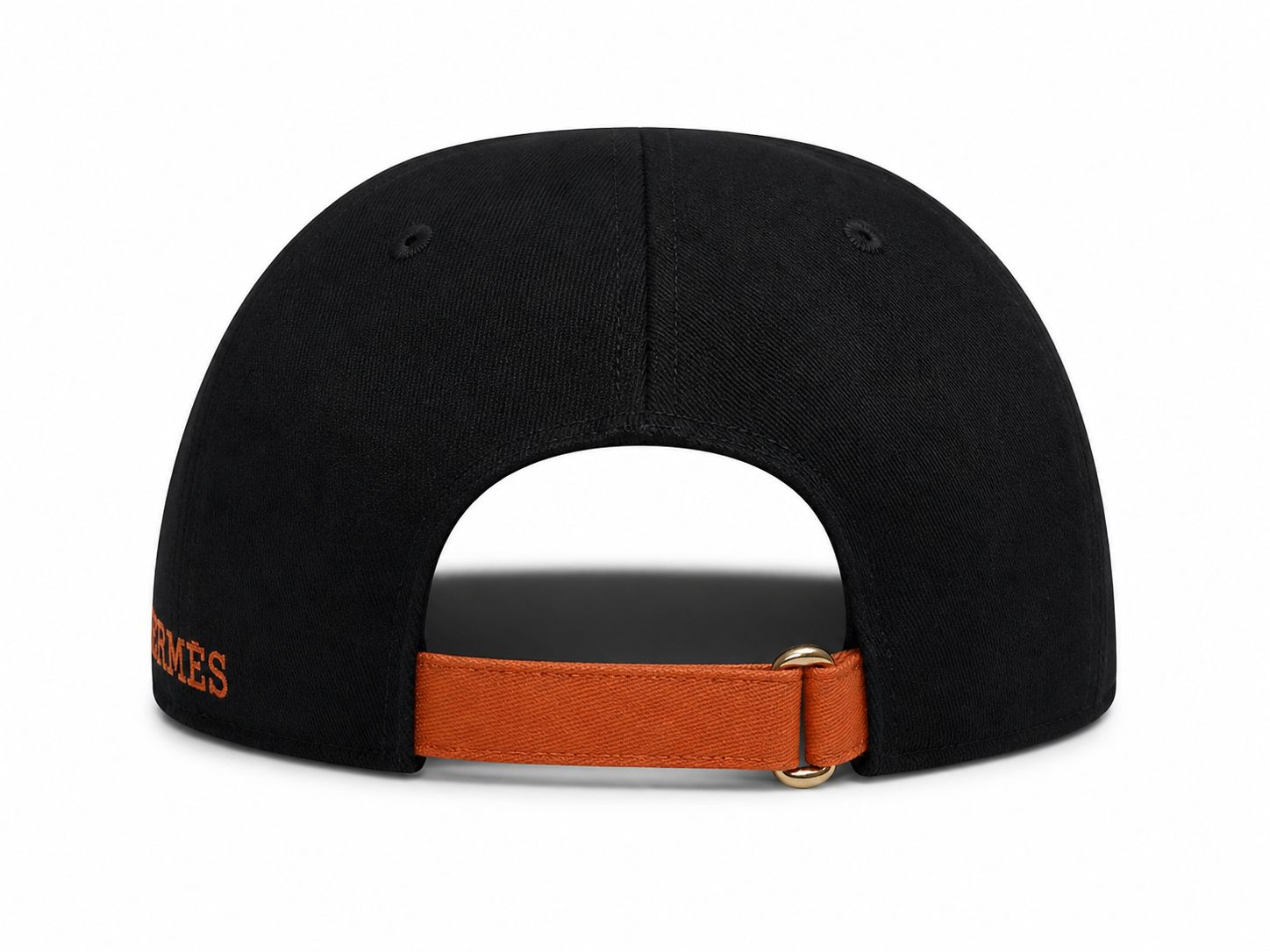 3d41f1ae-2a74-48d5-8342-ae6efd9b1642 | AE JERSEY Back view of a black cap with an orange adjustable strap and gold buckle.