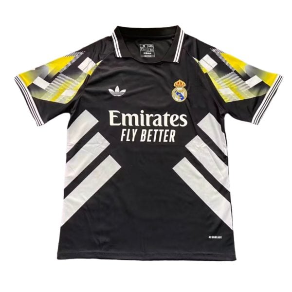 Black Real Madrid soccer jersey with white geometric accents and Emirates Fly Better sponsor logo