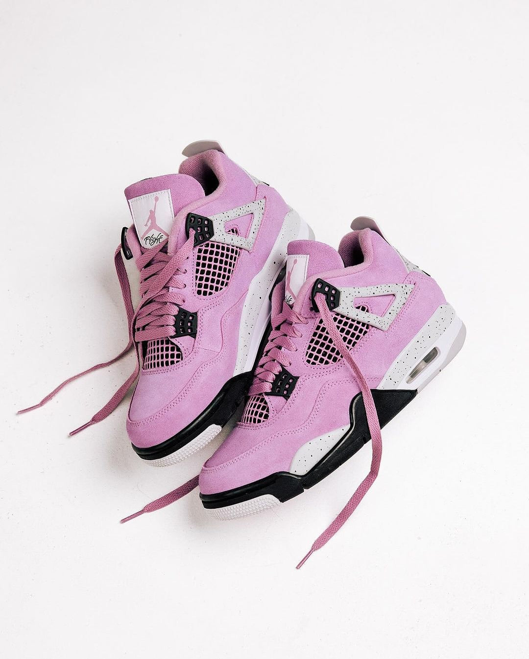 464594549_18379793398096448_2864881339672695649_n | AE JERSEY Pink Air Jordan sneakers with white and black accents on a white background.