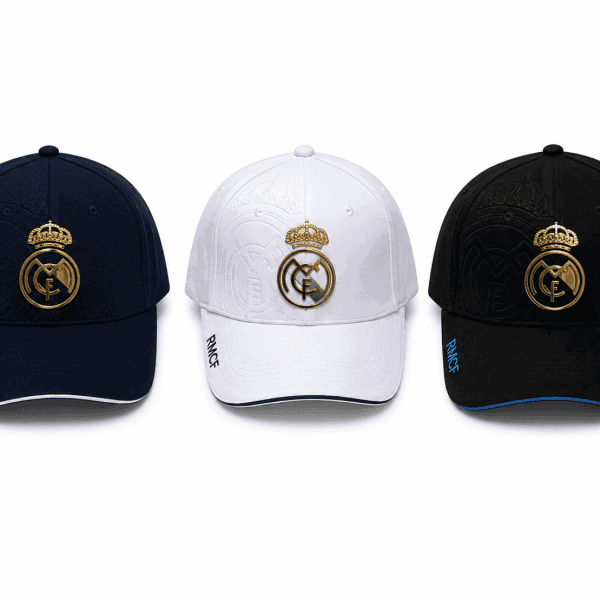 Three Real Madrid baseball caps in navy, white, and black with gold crest logos and blue trim on brims (RMCF on side).