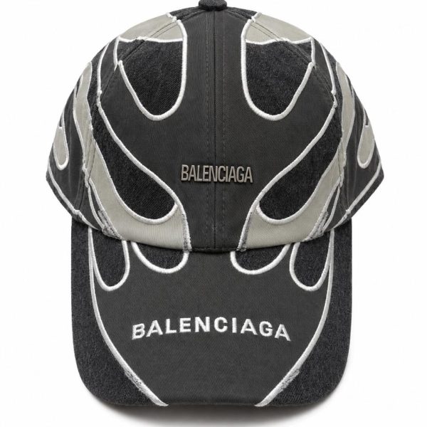 Black and dark gray Balenciaga baseball cap with white embroidered flame-like seams and the BALENCIAGA logo on the crown.