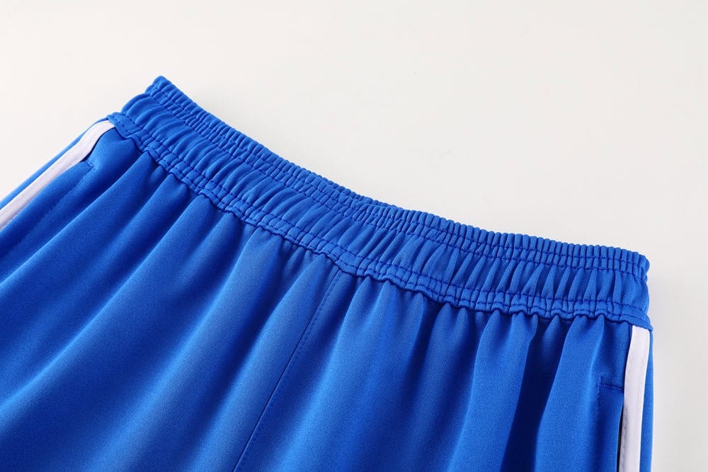 4f12b056 | AE JERSEY Blue athletic shorts with an elastic waistband and white side stripes.