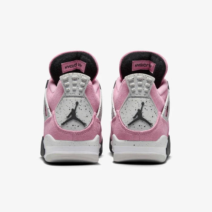 5d34a021_51c1_4b01_9f1b_82353a72cd52 | AE JERSEY Pair of pink and gray Jordan sneakers viewed from behind, displaying speckled gray heel panels and the Jumpman logo.