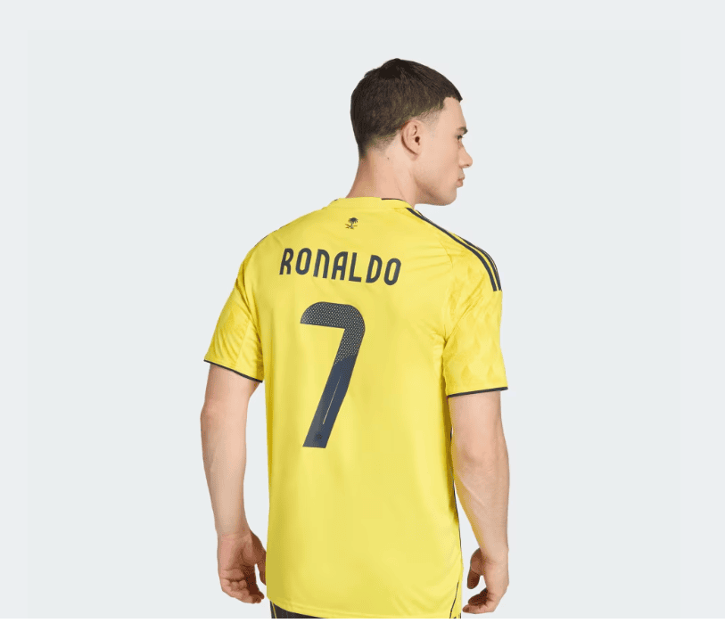 6A | AE JERSEY Back view of a yellow football jersey with the name 'RONALDO' and the number 7 on it.