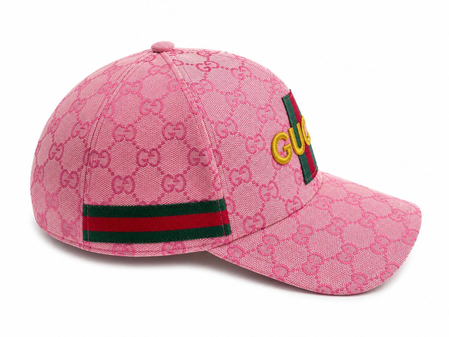 6e4cfcba-2bb8-4901-9963-61f4df26499a | AE JERSEY Pink Gucci baseball cap with all-over GG monogram, green-red-green web strap and yellow 'GUCCI' logo on the front.