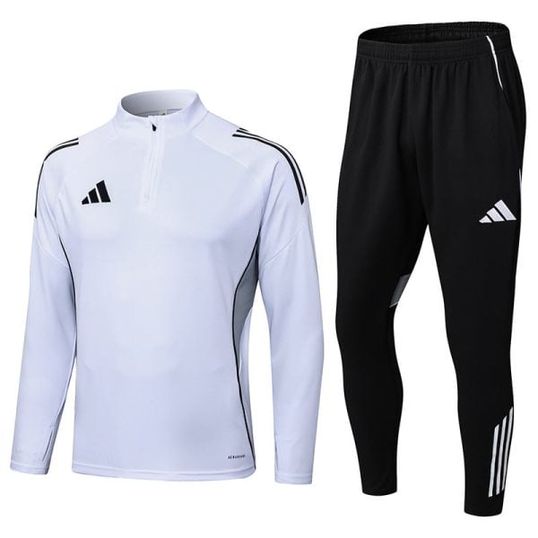 White long-sleeve athletic top with zip collar paired with black jogger pants; both feature Adidas branding and side panels.