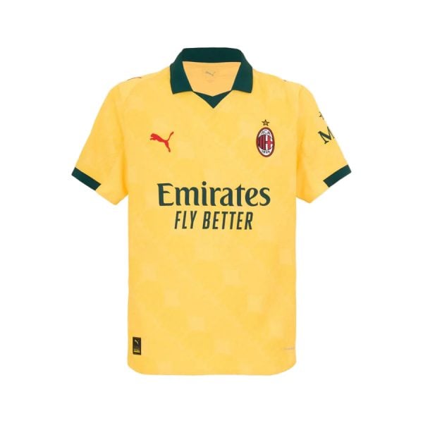 AC Milan yellow away jersey with green collar and sponsor text Emirates Fly Better across the front, and crest on the left chest.