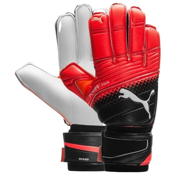 Red and black ice hockey goalie catching glove close-up, designed to catch pucks.