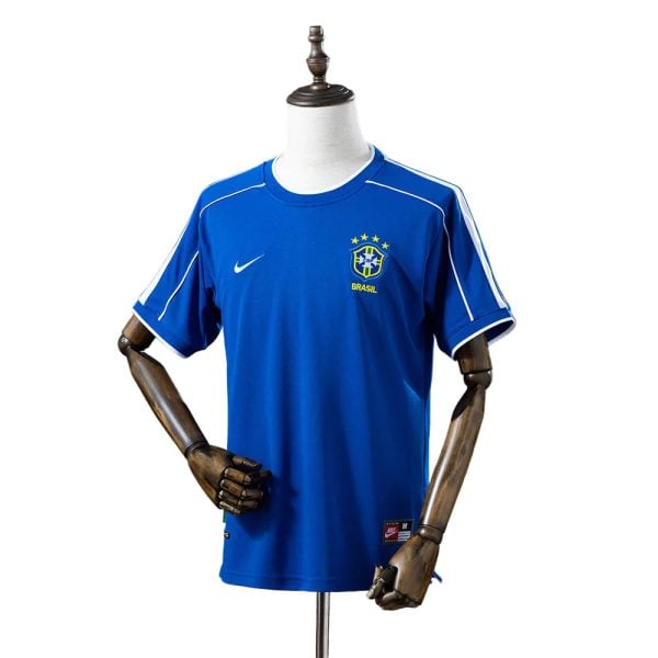 Blue Brazil national team soccer jersey on a mannequin, featuring the crest, stars, and Nike logo on the chest.