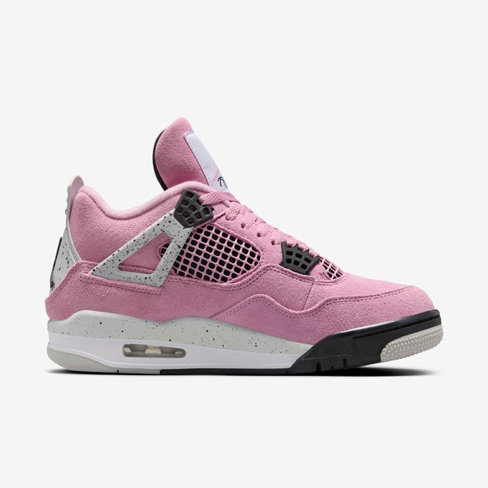 8cfcf8d6_9e91_4d0a_a06f_1804e0a20400 | AE JERSEY Pink suede sneaker with grey cage accents, black mesh panels, and a speckled white midsole featuring a visible air unit.