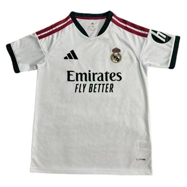 White Real Madrid football jersey featuring the crest, Adidas logo, maroon shoulder stripes, and the sponsor 'Emirates Fly Better'.