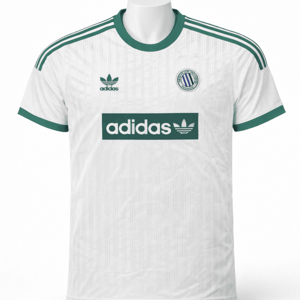 White Adidas soccer jersey with green accents, three green stripes on shoulders, sponsor logo 'adidas' across chest, team crest on left chest.