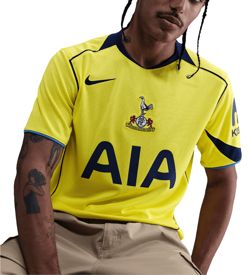 IMAGE-EDIT_59d4709f-5e69-4c30-814d-034656ccdd28 | AE JERSEY Person wearing a bright yellow soccer jersey with a crest on the chest and the large 'AIA' sponsor logo across the front.