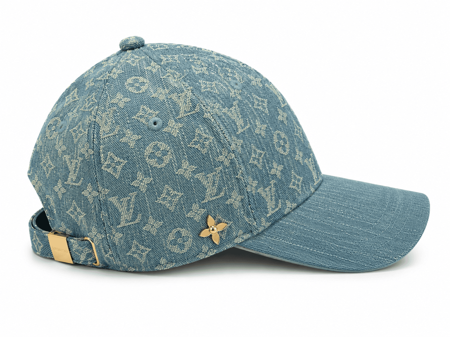 IMG-2053 | AE JERSEY Denim cap with Louis Vuitton monogram pattern, gold back strap buckle, and small gold flower pin edge detail.
