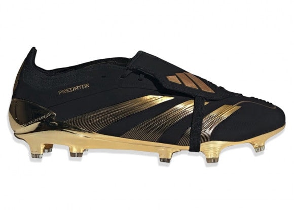 Black and gold Adidas Predator soccer cleat with a strap and metallic gold detailing on the soleplate and stripes.