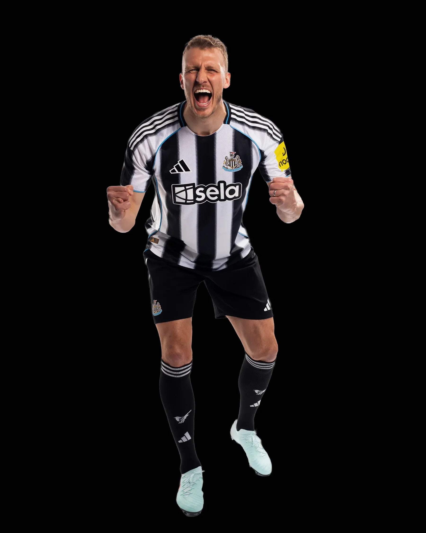 JI7391_PLAY_DB_13FNLver2_04535e60-b167-45a5-ad9a-9af962bf68c4 | AE JERSEY Male soccer player in a black-and-white striped jersey celebrating with fists clenched against a black background.