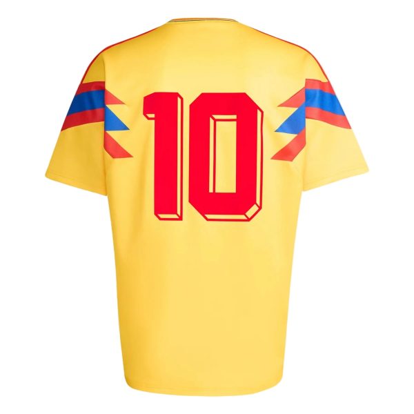 Back view of a yellow sports jersey with a large red number 10 and blue/red chevron stripes on the sleeves.