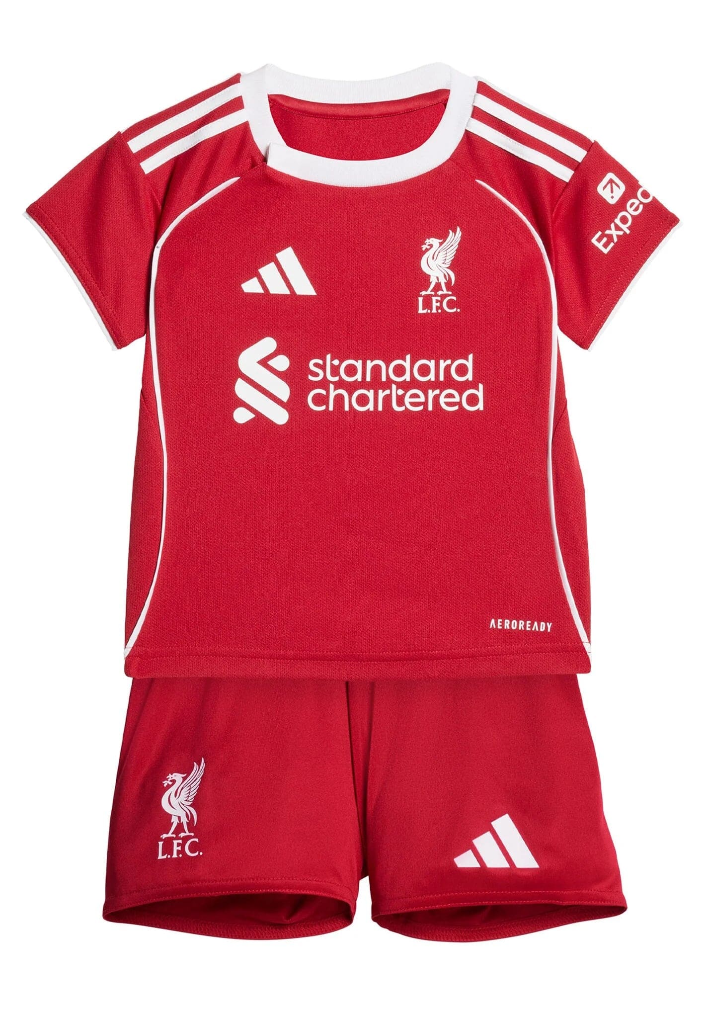 JV6443_F_Flat_eCom-lowres_1 | AE JERSEY Red Liverpool FC football jersey with white Adidas stripes on the shoulders, crest, and sponsor logos (Standard Chartered) visible; paired with matching red shorts showing club emblem.