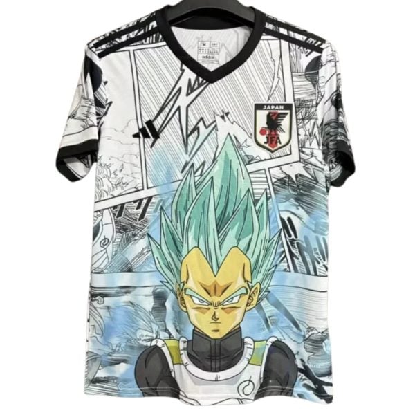 T-shirt printed with Dragon Ball Z character Vegeta in Super Saiyan blue, set against manga panel artwork and a Japan Football Association badge on the chest area.
