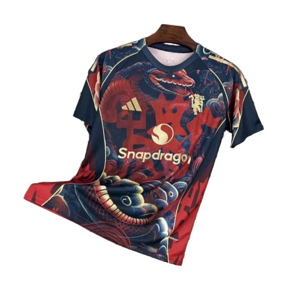 Red and navy esports jersey featuring a dragon graphic and Snapdragon sponsor logo on the front, hanging on a wooden hanger