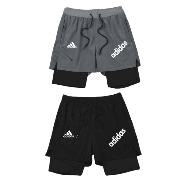 Two Adidas athletic shorts, gray over black with inner layer, featuring white Adidas logos and drawstrings.
