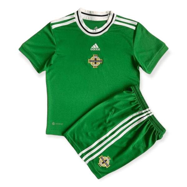 Green Adidas football jersey with NI Football Association crest on chest and white collar and shoulder stripes.
