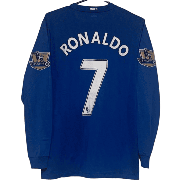 Blue Manchester United jersey showing the back with 'RONALDO' and the number 7, long sleeves and Barclays Premier League patches on the sleeves.