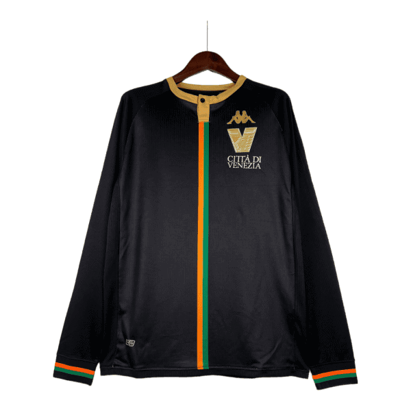 Black Venezia city jersey on a hanger featuring a gold collar, a green-orange vertical stripe, and Venezia crest with Kappa logo on the chest.