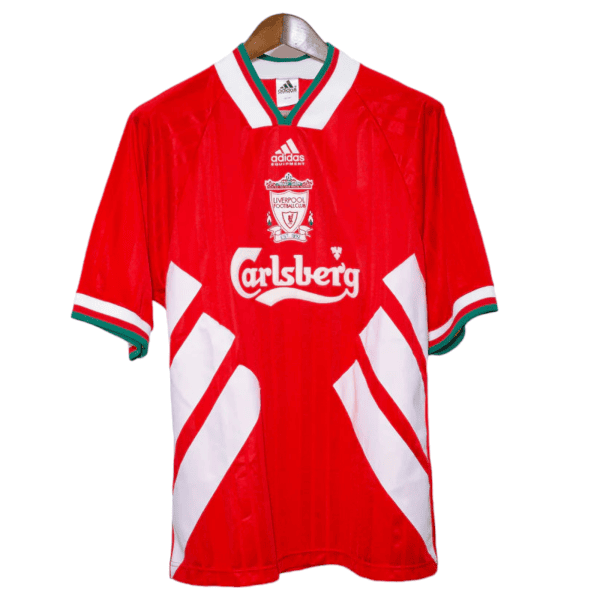 Red Liverpool FC jersey with white diagonal panels and green-trim collar, sponsor Carlsberg logo visible.