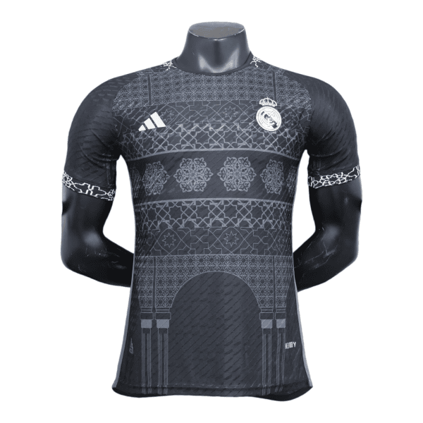 Dark Real Madrid soccer jersey on a mannequin with geometric patterns and white Adidas logo.