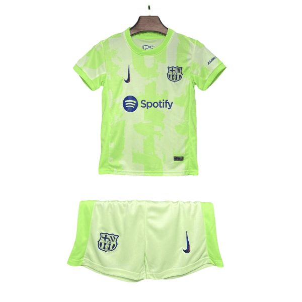 Bright lime FC Barcelona football jersey with Spotify sponsor on a hanger, paired with matching neon shorts.