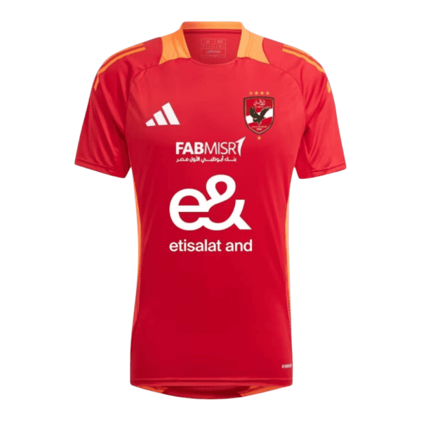 Red soccer jersey with orange shoulder accents, Adidas logo left chest, club crest right chest, and large white Etisalat sponsor text across front.