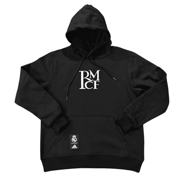 Black hoodie with a white stacked RM C E logo on the chest and Real Madrid tag hanging from the pocket area.