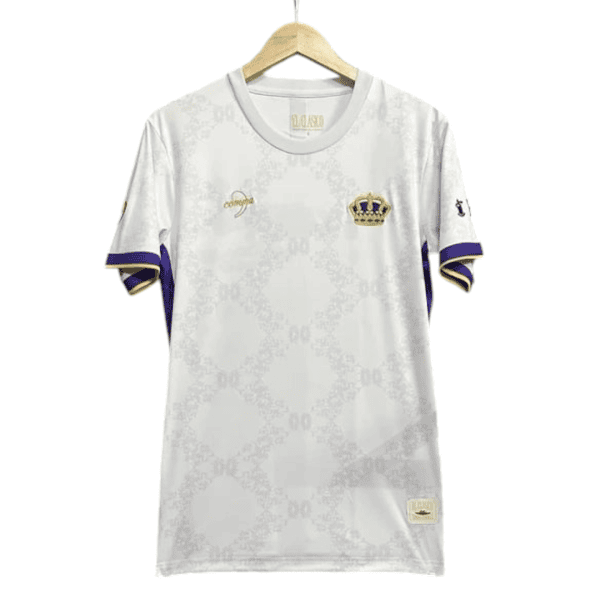White soccer jersey on a hanger with purple and gold trim and a crown crest on the left chest