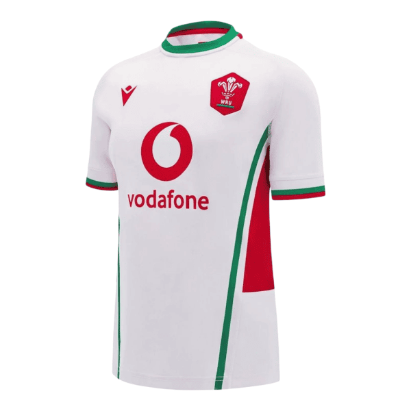 Front view of a white Wales rugby jersey with Vodafone sponsor logo and WRU crest, green and red trim details on collar and sides.