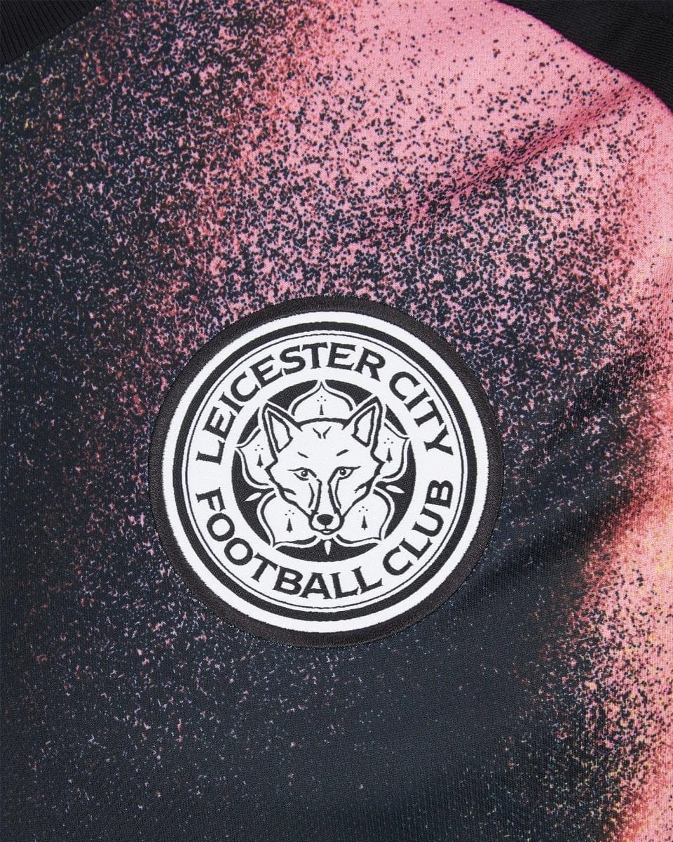 PsiAca0LnTQNkt0 | AE JERSEY Leicester City Football Club crest patch sewn onto a pink-speckled fabric surface.