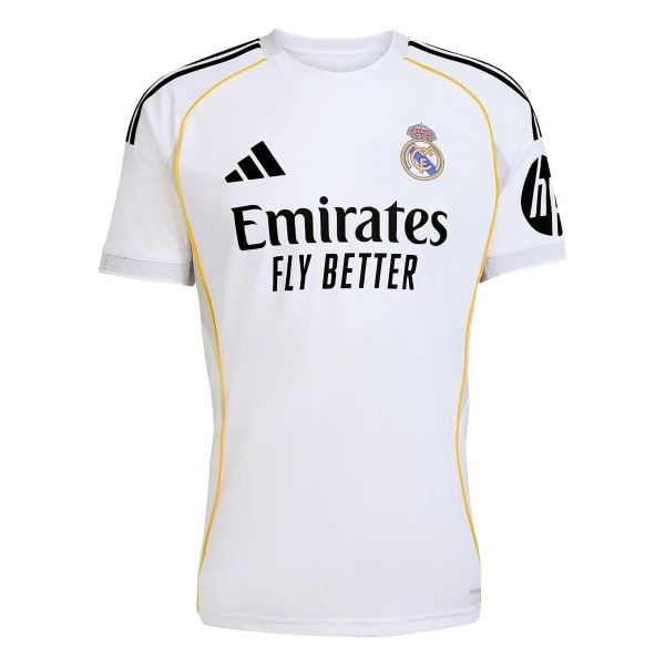 White Real Madrid soccer jersey with team crest and Emirates Fly Better sponsor across the chest, yellow piping detail.