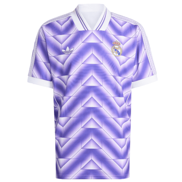 Purple Real Madrid Adidas football jersey with a geometric pattern, white collar, white sleeve cuffs, Adidas logo on left chest and Real Madrid crest on right chest.