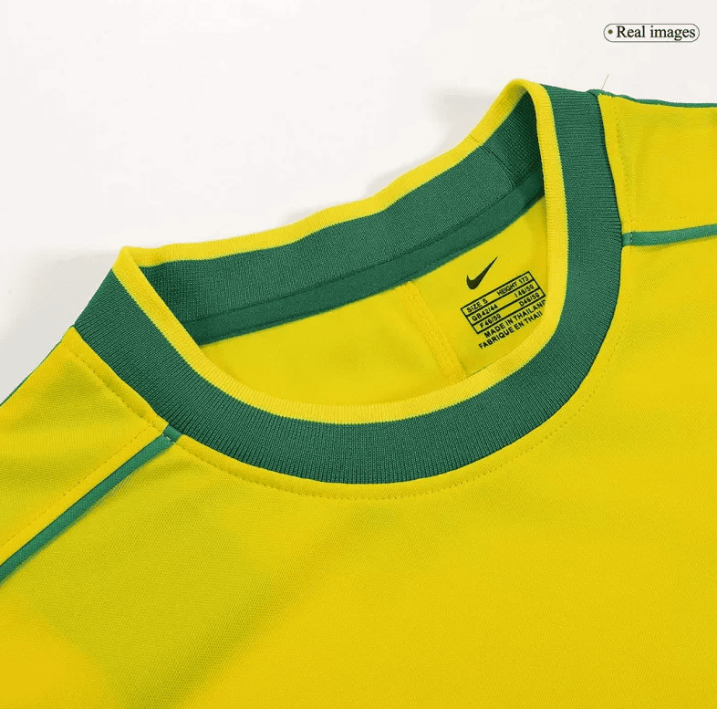 Screenshot_2024-07-20_032549 | AE JERSEY Bright yellow athletic shirt with a green crew neck trim and visible brand tag at the neck area.