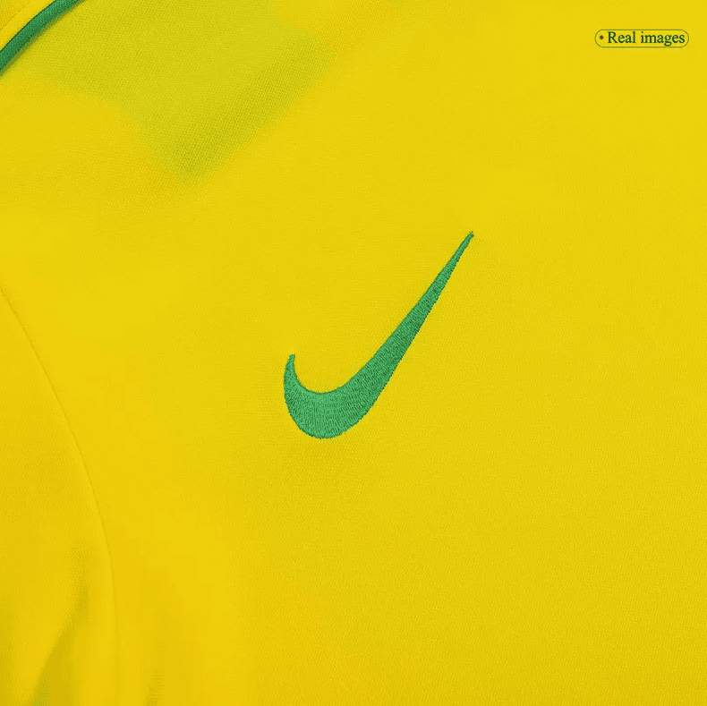 Screenshot_2024-07-20_032601 | AE JERSEY Bright yellow Nike athletic shirt fabric with a green swoosh logo close-up on the chest area.