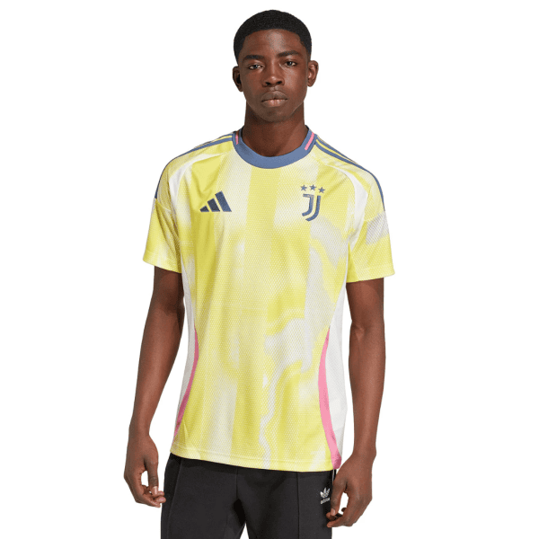 Male model wearing a bright yellow Juventus soccer jersey with Adidas logo against a white background.