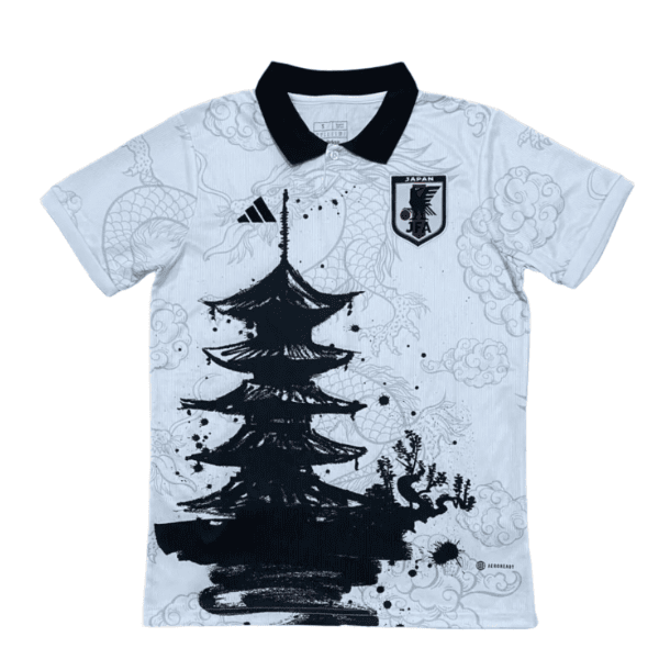 Light blue polo shirt featuring a large black pagoda graphic on the front and a black collar, with a Japan JFA crest on the chest.